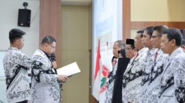 Wali Kota Makassar, Munafri Arifuddin, saat memberikan sambutan pada Pengukuhan Pengurus PGRI Kota Makassar Masa Bakti 2025–2030 di BBPMP Sulsel.