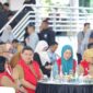 Foto: Wali Kota Makassar Munafri Arifuddin, Wakil Wali Kota Makassar Aliyah Mustika Ilham, Ketua TP PKK Melinda Aksa dalam Launching program Makassar Berjasa berlangsung meriah di Tribun Lapangan Karebosi