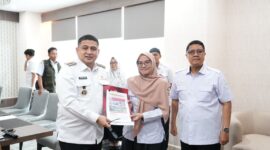 Kepala Dinas Sosial Kota Makassar, Andi Bukti Djufrie bersama Wali Kota Makassar, Munafri Arifuddin