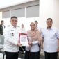 Kepala Dinas Sosial Kota Makassar, Andi Bukti Djufrie bersama Wali Kota Makassar, Munafri Arifuddin